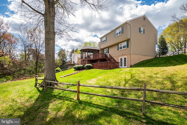 10 Fullview Ct, Gaithersburg, MD 20878 - back of property featuring a wooden deck, fence, a yard, and french doors