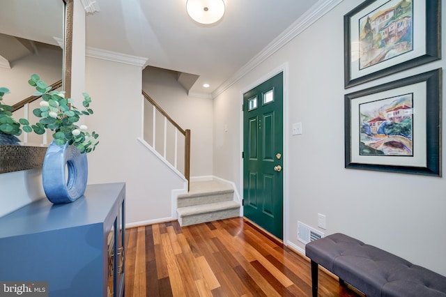 10 Fullview Ct, Gaithersburg, MD 20878 - entryway featuring wood finished floors, stairs, baseboards, ornamental molding, and visible vents