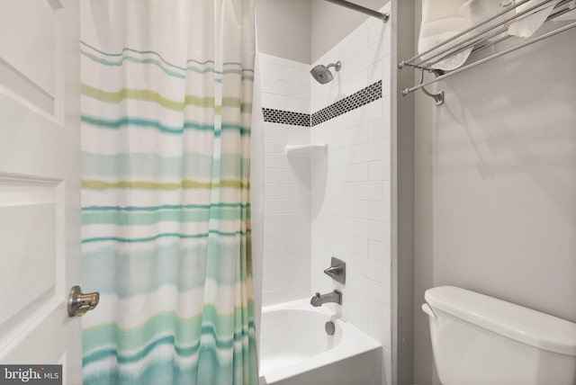 bathroom featuring toilet and shower / tub combo with curtain