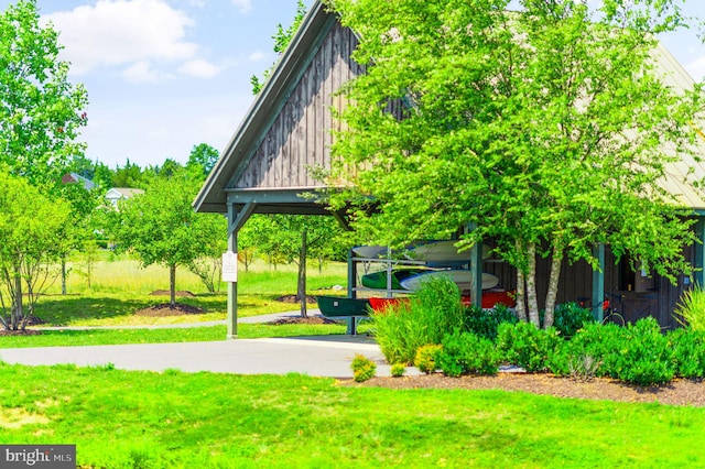 view of property's community with a yard