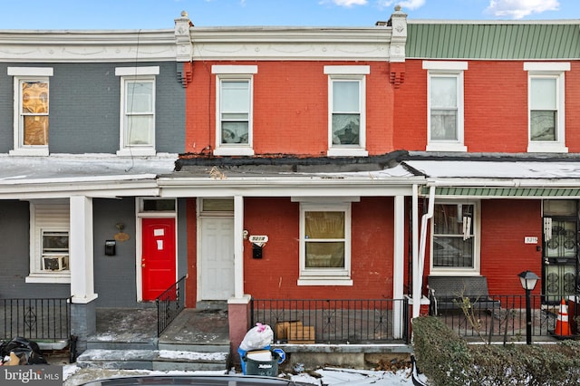 5214 W Stiles St, Philadelphia, PA 19131 - multi unit property with brick siding, covered porch, and a fenced front yard