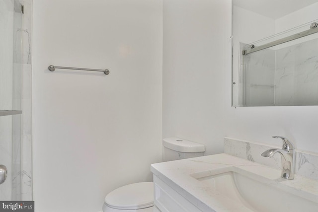 1820 Aiken St, Baltimore, MD 21213 - full bath featuring a marble finish shower, toilet, and vanity