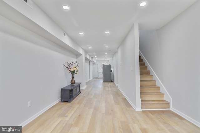 1820 Aiken St, Baltimore, MD 21213 - corridor featuring recessed lighting, light wood-style floors, baseboards, and stairs