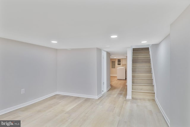 1820 Aiken St, Baltimore, MD 21213 - finished basement with light wood-style flooring, recessed lighting, baseboards, and stairway