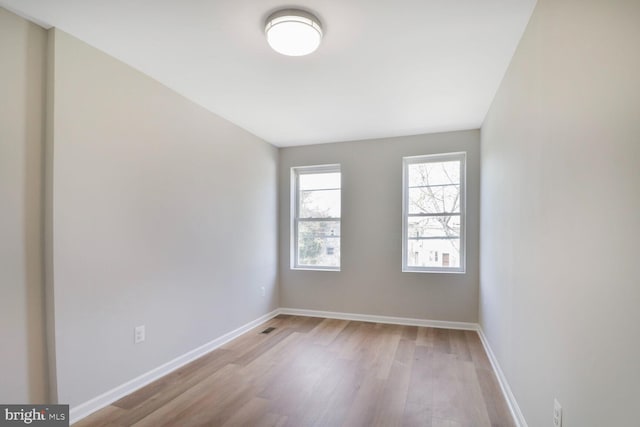 1820 Aiken St, Baltimore, MD 21213 - unfurnished room featuring light wood-style floors, baseboards, and visible vents