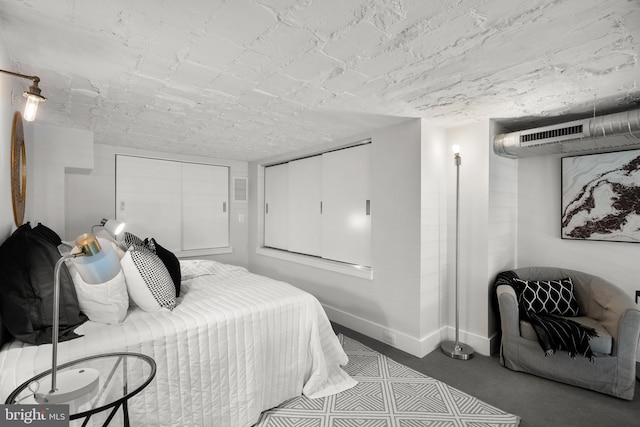 1401 R St NW Unit 304, Washington, DC 20009 - bedroom with carpet floors and baseboards