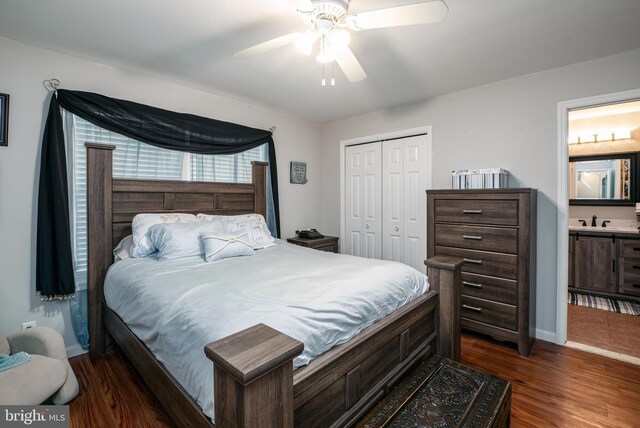 129 Prince Georges Dr, Dagsboro, DE 19939 - bedroom with a ceiling fan, a sink, a closet, baseboards, and dark wood-style flooring