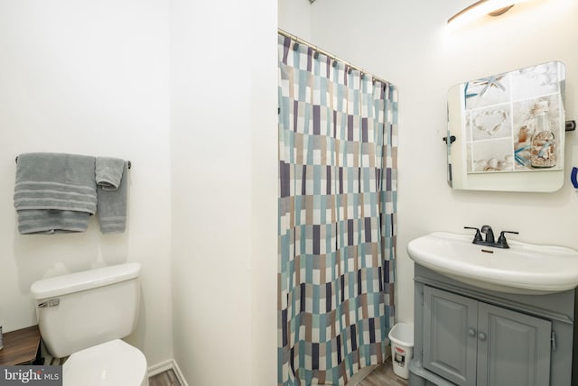 129 Prince Georges Dr, Dagsboro, DE 19939 - full bathroom with a shower with curtain, wood finished floors, vanity, and toilet