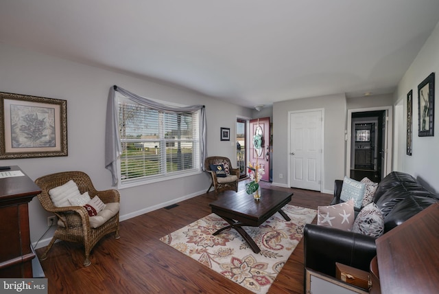 129 Prince Georges Dr, Dagsboro, DE 19939 - living area with wood finished floors, visible vents, and baseboards
