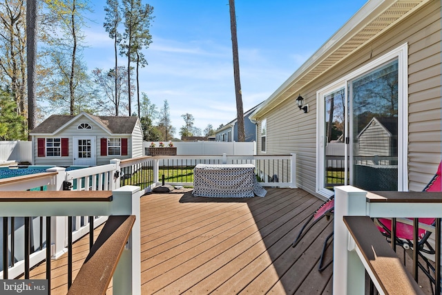 129 Prince Georges Dr, Dagsboro, DE 19939 - wooden terrace with an outdoor structure and a fenced backyard
