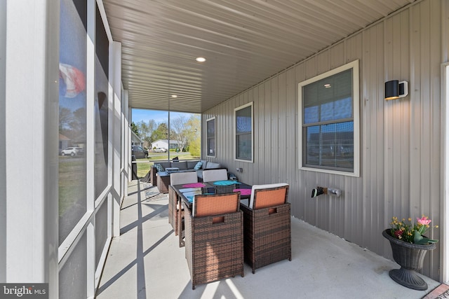 129 Prince Georges Dr, Dagsboro, DE 19939 - view of patio with outdoor dining space and an outdoor living space
