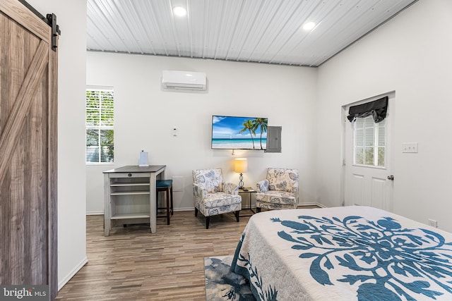 129 Prince Georges Dr, Dagsboro, DE 19939 - bedroom with recessed lighting, a wall mounted AC, wood finished floors, and baseboards
