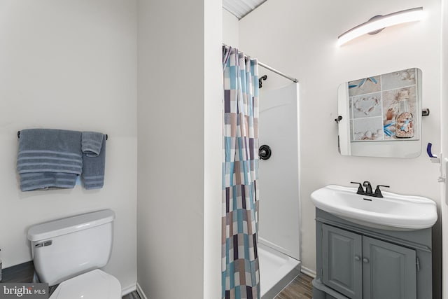 129 Prince Georges Dr, Dagsboro, DE 19939 - bathroom with a shower stall, toilet, vanity, and wood finished floors