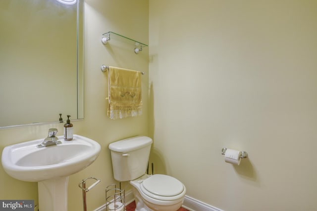 113 Anna Ct, Middletown, DE 19709 - bathroom featuring a sink, baseboards, and toilet