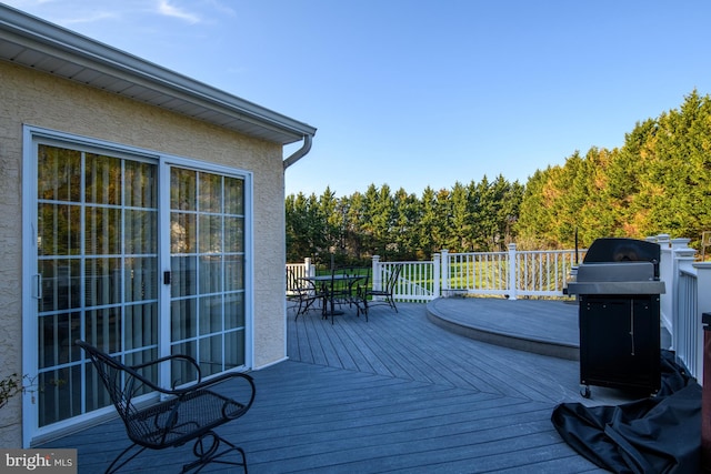 113 Anna Ct, Middletown, DE 19709 - deck with outdoor dining area and a grill