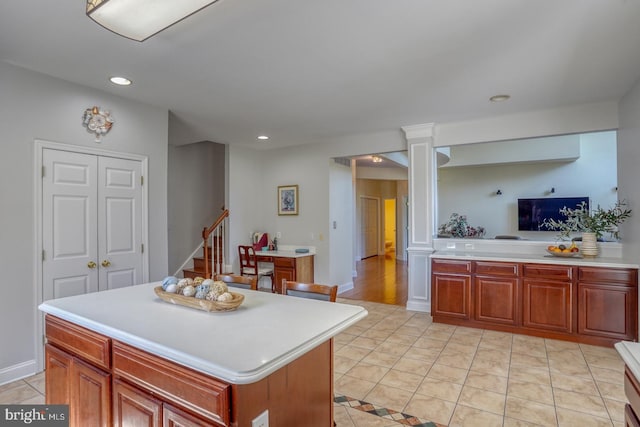113 Anna Ct, Middletown, DE 19709 - kitchen featuring light countertops, recessed lighting, decorative columns, and light tile patterned flooring