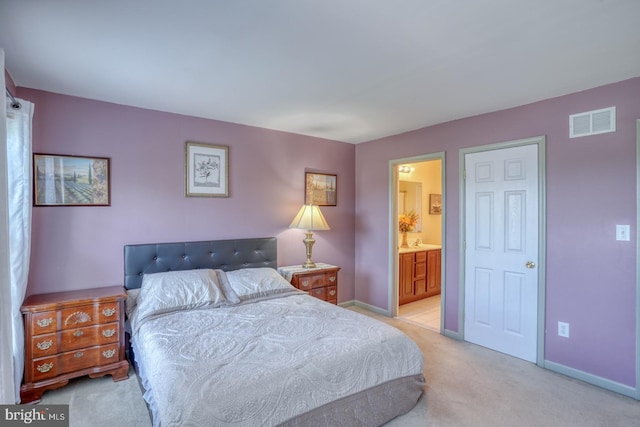 113 Anna Ct, Middletown, DE 19709 - bedroom with baseboards, light colored carpet, ensuite bath, and visible vents