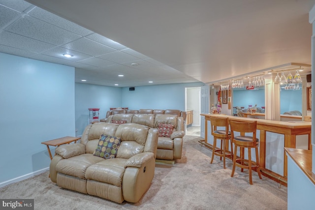113 Anna Ct, Middletown, DE 19709 - carpeted living room featuring a bar and recessed lighting