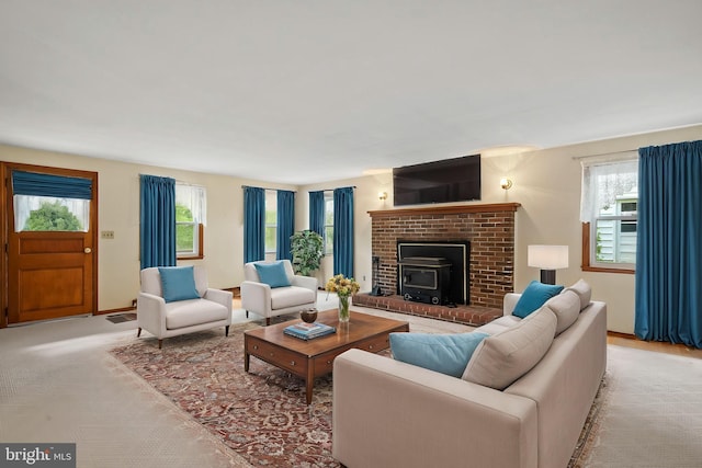 living room with baseboards and a wealth of natural light