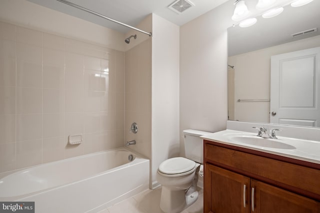 bathroom featuring toilet, vanity, shower / washtub combination, and tile patterned flooring