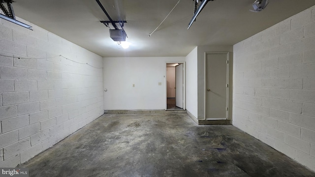 2028 6th St S, Arlington, VA 22204 - garage featuring a garage door opener and concrete block wall