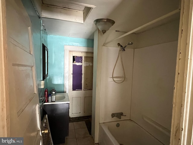 full bath with bathing tub / shower combination, vanity, and tile patterned flooring