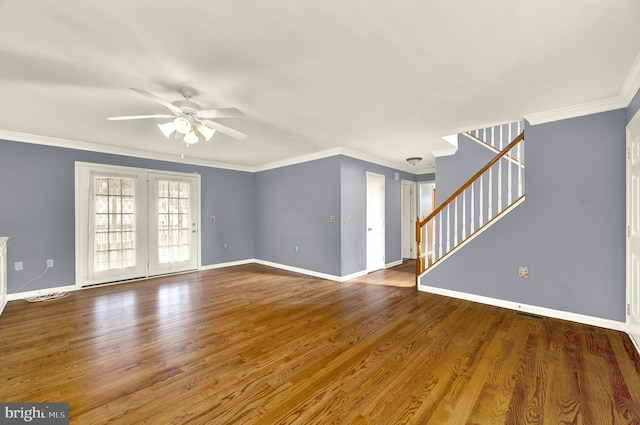 unfurnished living room with a ceiling fan, baseboards, stairs, and ornamental molding
