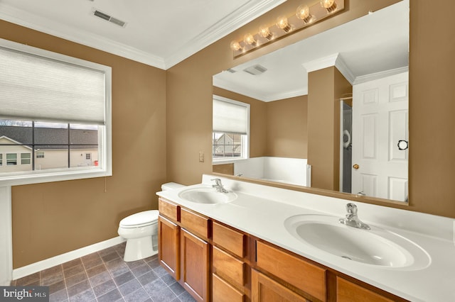 full bathroom with baseboards, toilet, a sink, and visible vents