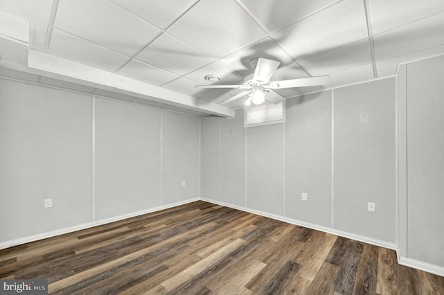 interior space featuring baseboards, wood finished floors, and ceiling fan
