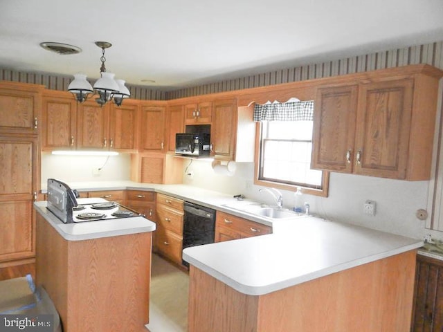 2560 Sardonyx Dr, Chambersburg, PA 17202 - kitchen featuring an inviting chandelier, dishwasher, a sink, light countertops, and stainless steel microwave