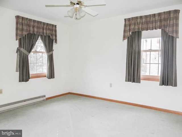 2560 Sardonyx Dr, Chambersburg, PA 17202 - spare room with a wealth of natural light, a ceiling fan, a baseboard radiator, and baseboards