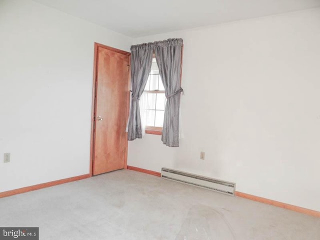 2560 Sardonyx Dr, Chambersburg, PA 17202 - carpeted empty room featuring a baseboard radiator and baseboards