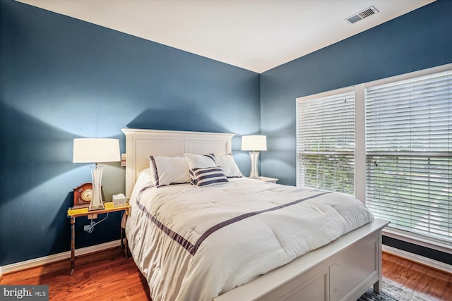 4129 Fountainside Ln Unit 202, Fairfax, VA 22030 - bedroom with wood finished floors and baseboards