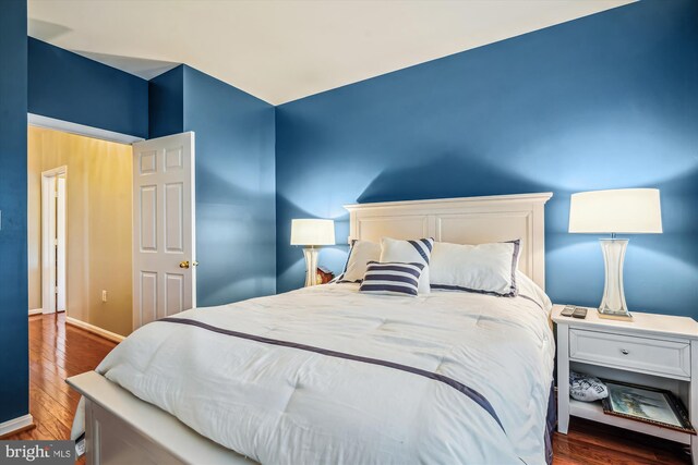 4129 Fountainside Ln Unit 202, Fairfax, VA 22030 - bedroom featuring wood finished floors and baseboards