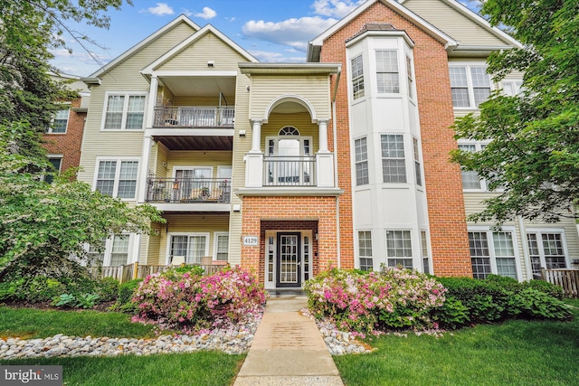4129 Fountainside Ln Unit 202, Fairfax, VA 22030 - view of property featuring a balcony and brick siding