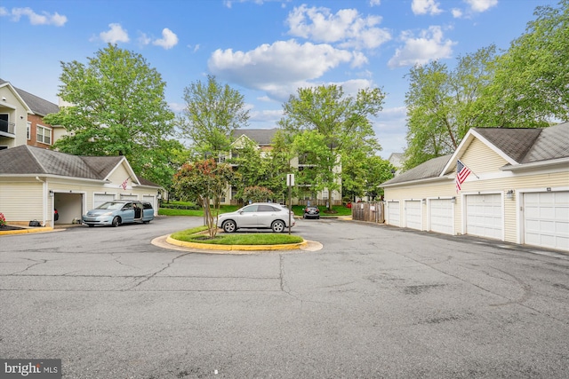 4129 Fountainside Ln Unit 202, Fairfax, VA 22030 - view of asphalt road featuring community garages