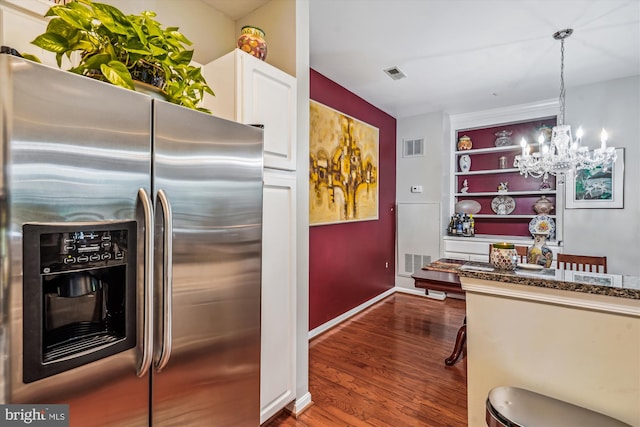 4129 Fountainside Ln Unit 202, Fairfax, VA 22030 - kitchen with stainless steel refrigerator with ice dispenser, dark wood finished floors, white cabinets, a chandelier, and baseboards