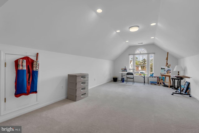 interior space with recessed lighting, lofted ceiling, carpet flooring, and baseboards