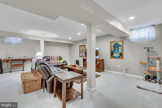 living room with baseboards, light carpet, and recessed lighting