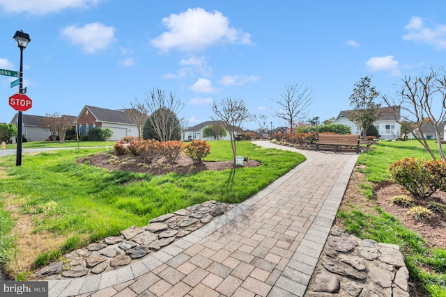 surrounding community with a yard