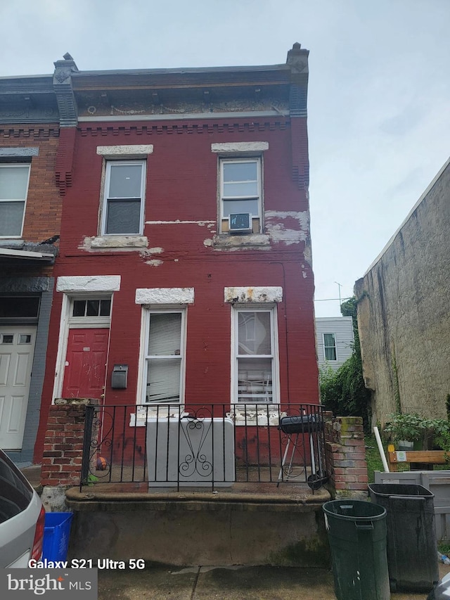 2538 N Myrtlewood St, Philadelphia, PA 19132 - townhome / multi-family property with fence and brick siding