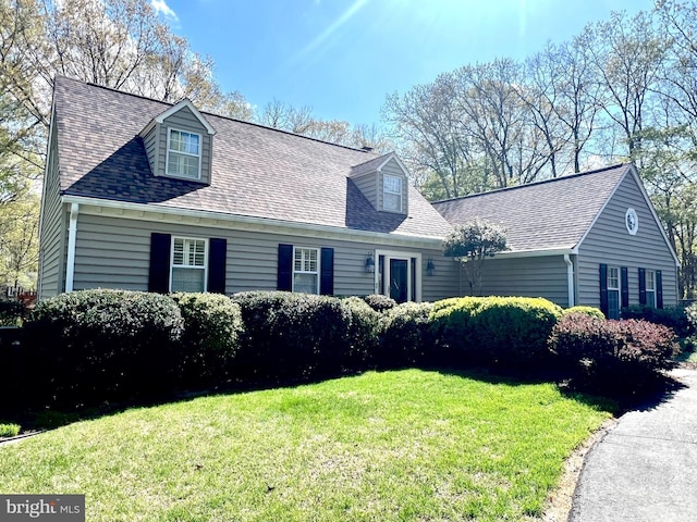 135 Cleremont Dr, Fredericksburg, VA 22405 - cape cod-style house featuring a shingled roof and a front lawn