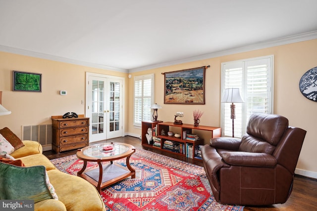 135 Cleremont Dr, Fredericksburg, VA 22405 - living area featuring visible vents, baseboards, crown molding, wood finished floors, and french doors