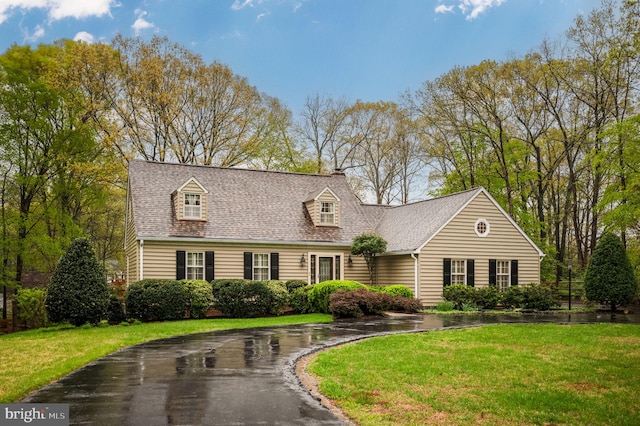 135 Cleremont Dr, Fredericksburg, VA 22405 - new england style home with a chimney, a shingled roof, and a front yard