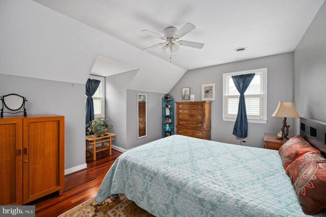 135 Cleremont Dr, Fredericksburg, VA 22405 - bedroom featuring visible vents, baseboards, dark wood-style flooring, ceiling fan, and vaulted ceiling