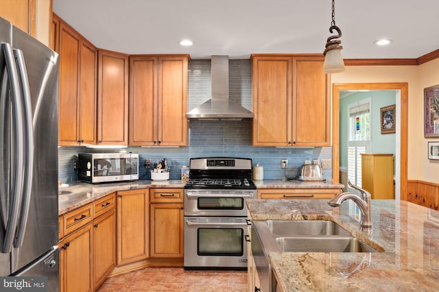 135 Cleremont Dr, Fredericksburg, VA 22405 - kitchen featuring stainless steel appliances, wall chimney exhaust hood, a sink, and light stone counters