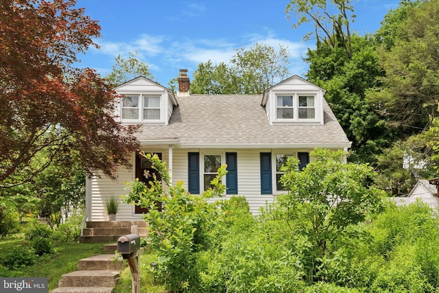 113 Spring St, Media, PA 19063 - view of front facade with a chimney and a shingled roof