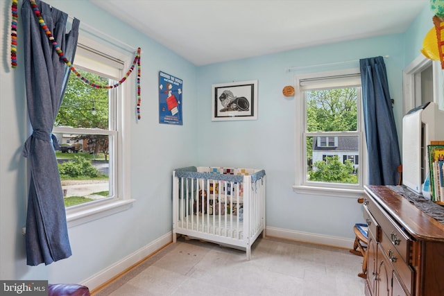 113 Spring St, Media, PA 19063 - bedroom with baseboards and a nursery area
