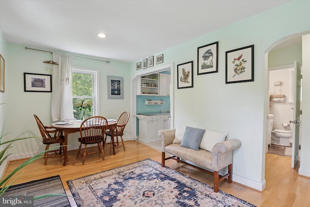 113 Spring St, Media, PA 19063 - sitting room featuring arched walkways, light wood finished floors, baseboards, and recessed lighting