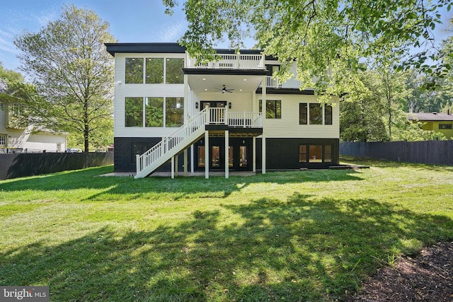 4134 Maple Ave, Fairfax, VA 22032 - back of house featuring fence, a ceiling fan, stairs, and a yard